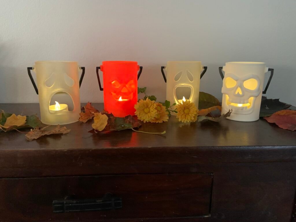 four halloween lanterns: Happy Ghost, Jack-O-Lantern, Sad Ghost, Skull